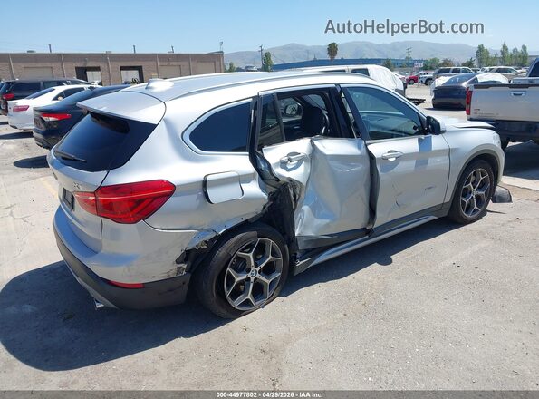 WBXHT3C31GP886433 2016 BMW X1 Серебряный Задняя правая четверть