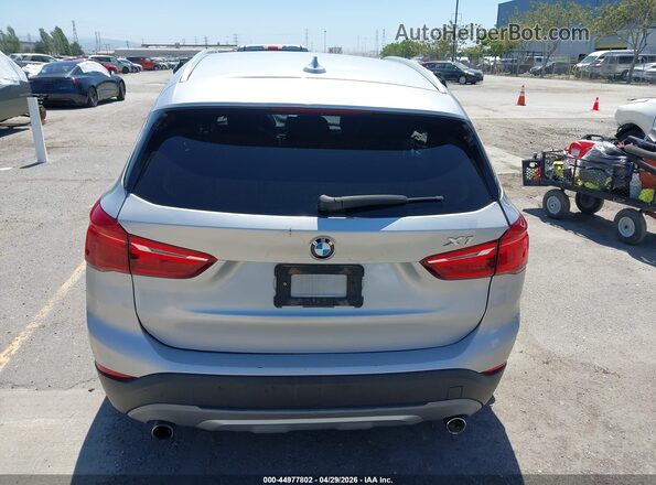 WBXHT3C31GP886433 2016 BMW X1 Серебряный 