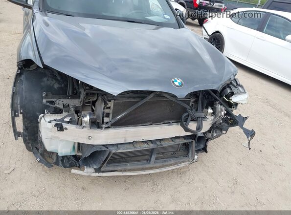 WBXHT3C31H5F78131 2017 BMW X1 Gray Front view
