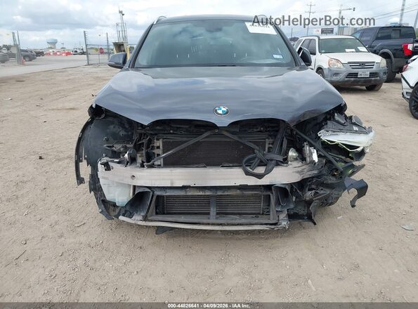 WBXHT3C31H5F78131 2017 BMW X1 Gray Rear interior view