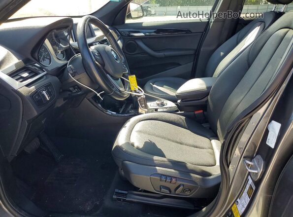 WBXHT3C33G5E55882 2016 BMW X1 Gray Вид салону спереду