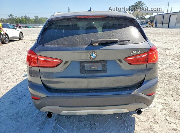 WBXHT3C33G5E55882 2016 BMW X1 Gray Вид ззаду