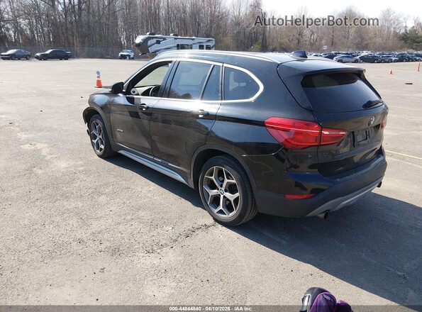 WBXHT3C33H5F76493 2017 BMW X1 Black 
