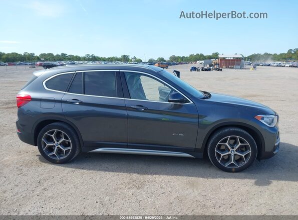 WBXHT3C34H5F79502 2017 BMW X1 Gray Widok wnętrza 360 stopni