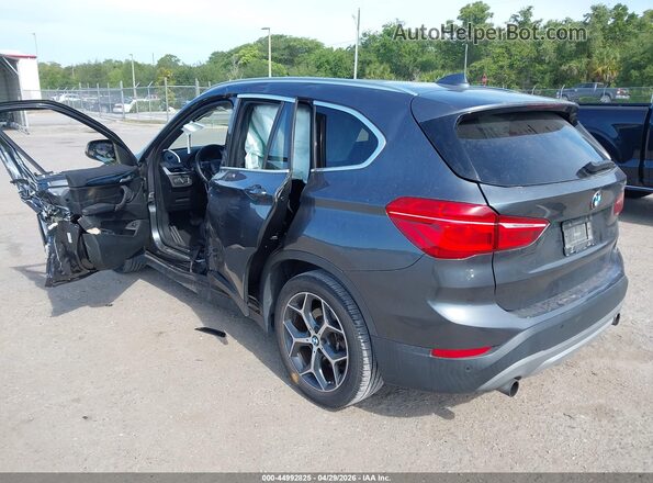 WBXHT3C34H5F79502 2017 BMW X1 Gray Tył lewy