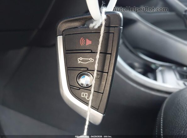 WBXHT3C34H5F79502 2017 BMW X1 Gray Widok deski rozdzielczej