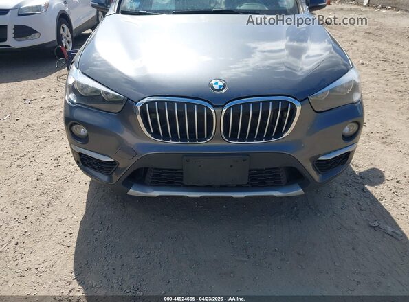 WBXHT3C34J5F92272 2018 BMW X1 Gray Вид щитка приладів