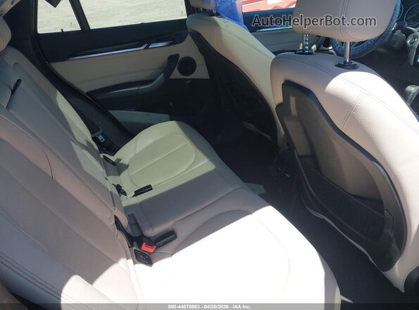 WBXHT3C35G5E48562 2016 BMW X1 Gray VIN კოდის სტიკერის ხედი