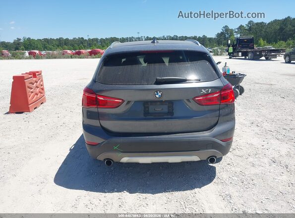 WBXHT3C35G5E48562 2016 BMW X1 Gray 