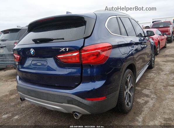 WBXHT3C35J5K21554 2018 BMW X1 Blue Rear right