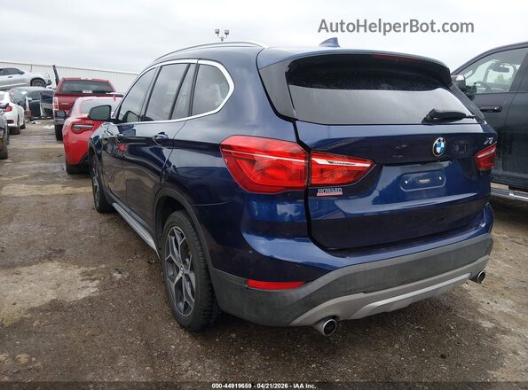 WBXHT3C35J5K21554 2018 BMW X1 Blue Rear left