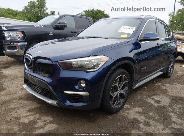 WBXHT3C35J5K21554 2018 BMW X1 Blue Front left