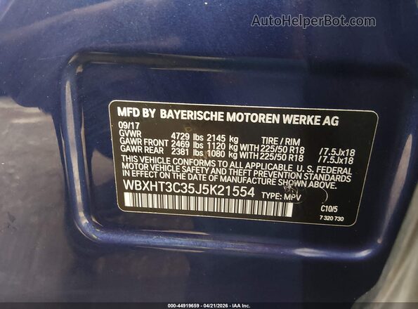 WBXHT3C35J5K21554 2018 BMW X1 Blue Engine compartment view
