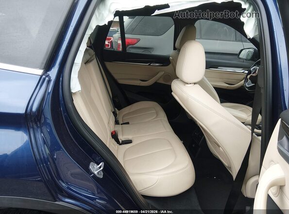 WBXHT3C35J5K21554 2018 BMW X1 Blue VIN sticker view