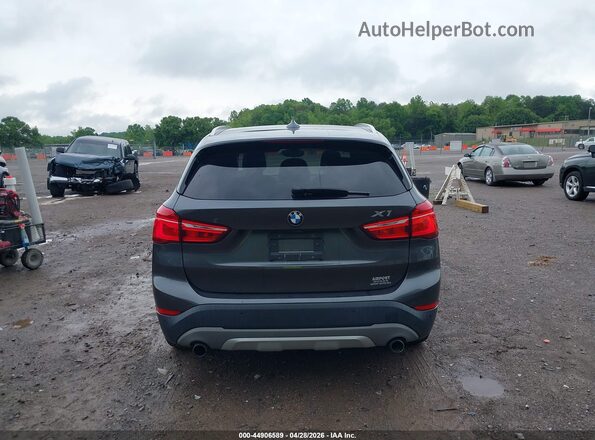 WBXHT3C37G5E51267 2016 BMW X1 Gray 