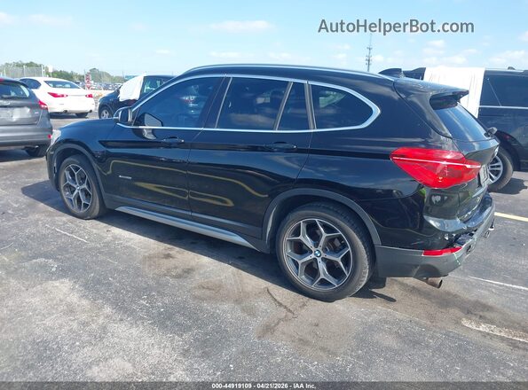 WBXHT3C38G5E52850 2016 BMW X1 Black Tył lewy