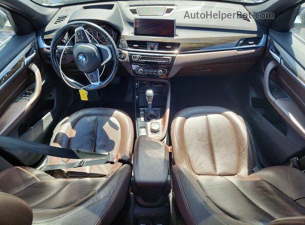 WBXHT3C38G5E56512 2016 BMW X1 Silver წინა პანელის ხედი