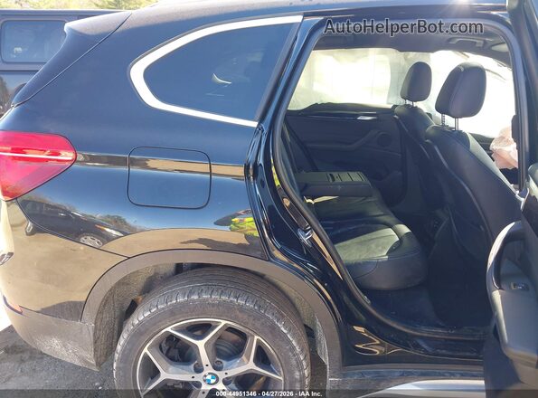 WBXHT3C38G5F64564 2016 BMW X1 Black VIN sticker view