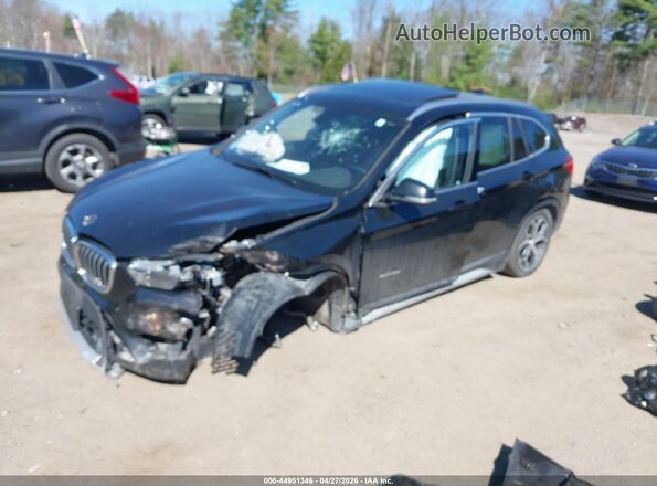 WBXHT3C38G5F64564 2016 BMW X1 Black Front left