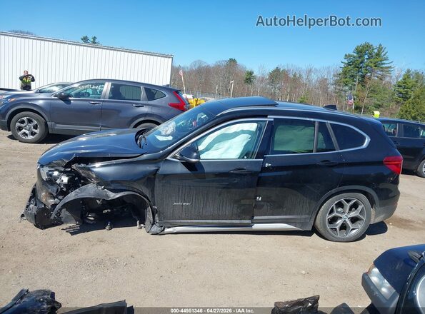 WBXHT3C38G5F64564 2016 BMW X1 Black 360 interior view