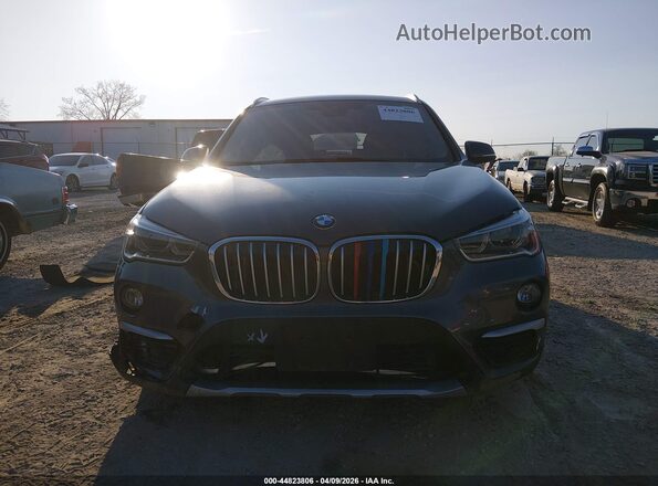 WBXHT3C38G5F66993 2016 BMW X1 Gray Instrument cluster view