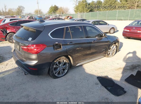 WBXHT3C38G5F66993 2016 BMW X1 Gray Rear right