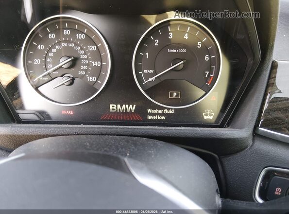 WBXHT3C38G5F66993 2016 BMW X1 Gray Rear seats view
