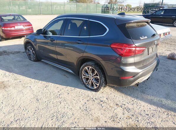 WBXHT3C38G5F66993 2016 BMW X1 Gray Rear left