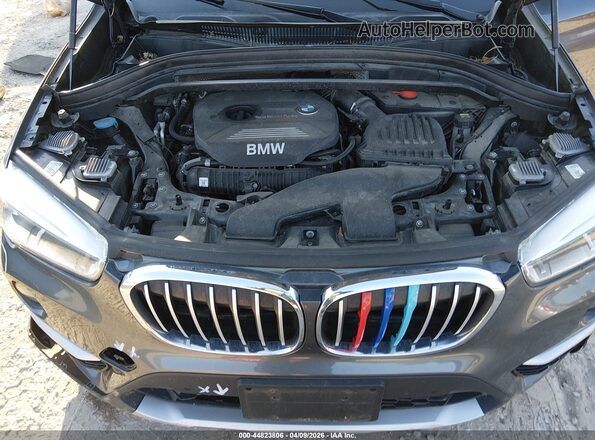 WBXHT3C38G5F66993 2016 BMW X1 Gray Rear view