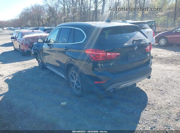 WBXHT3C38H5F73685 2017 BMW X1 Black Trasero izquierdo