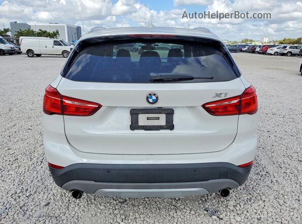 WBXHT3C38H5F75002 2017 BMW X1 White უკანა ხედი