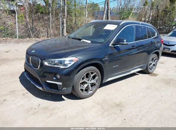 WBXHT3C39G5E50220 2016 BMW X1 Black Front left