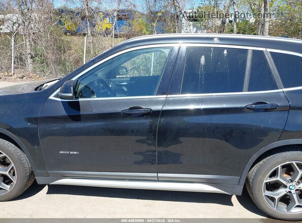 WBXHT3C39G5E50220 2016 BMW X1 Black 360 interior view