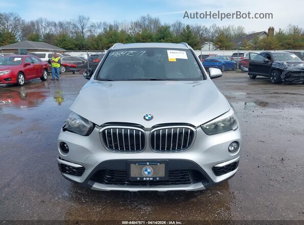 WBXHT3C39J5K22657 2018 BMW X1 Silver ხელსაწყოთა პანელის ხედი