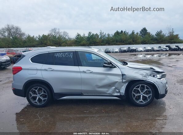 WBXHT3C39J5K22657 2018 BMW X1 Silver უკანა სალონის ხედი