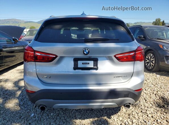 WBXHT3C52K3H36562 2019 BMW X1 Silver Rear view
