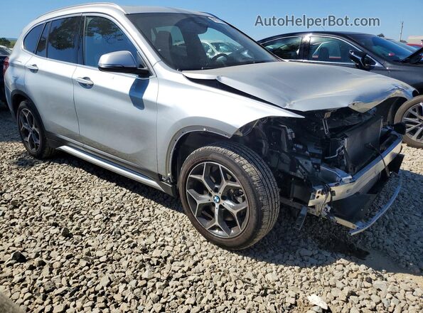 WBXHT3C52K3H36562 2019 BMW X1 Silver Front right
