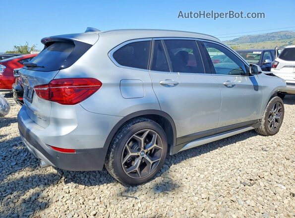 WBXHT3C52K3H36562 2019 BMW X1 Silver Rear right