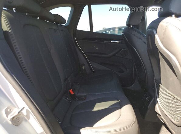 WBXHT3C52K3H36562 2019 BMW X1 Silver Rear interior view