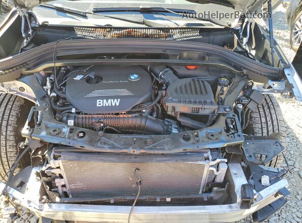 WBXHT3C52K3H36562 2019 BMW X1 Silver Engine compartment view