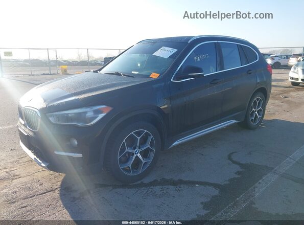 WBXHT3C5XK5L37562 2019 BMW X1 Black Front left