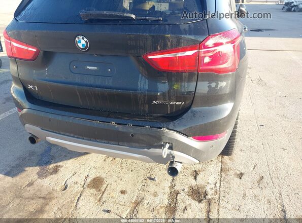 WBXHT3C5XK5L37562 2019 BMW X1 Black Front view