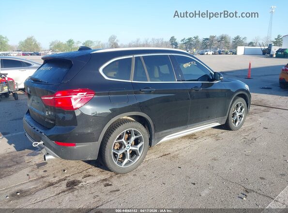 WBXHT3C5XK5L37562 2019 BMW X1 Black Rear right