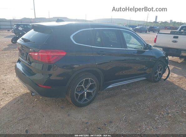 WBXHT3Z33G4A48156 2016 BMW X1 Black Rear right