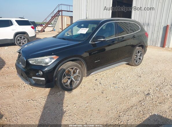 WBXHT3Z33G4A48156 2016 BMW X1 Black Front left