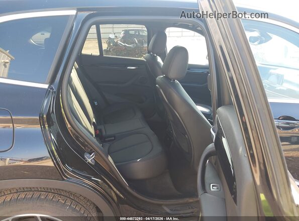 WBXHT3Z33G4A48156 2016 BMW X1 Black VIN sticker view