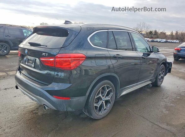 WBXHT3Z3XG4A48199 2016 BMW X1 Black Rear right
