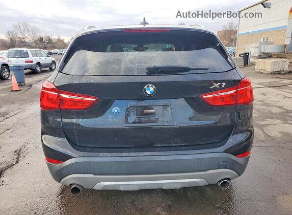 WBXHT3Z3XG4A48199 2016 BMW X1 Black Rear view