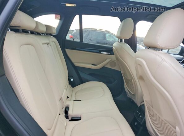 WBXHT3Z3XG4A48199 2016 BMW X1 Black Rear seats view