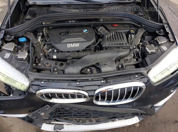 WBXHT3Z3XG4A48199 2016 BMW X1 Black Rear interior view